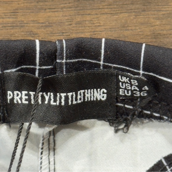 PrettyLittleThing Black Grid Check Kick Flare Split Hem Detail Pant Size 4 Women - Picture 6 of 11